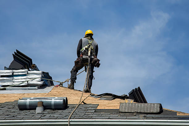 Professional Roof Replacement technician working in Smyer, TX